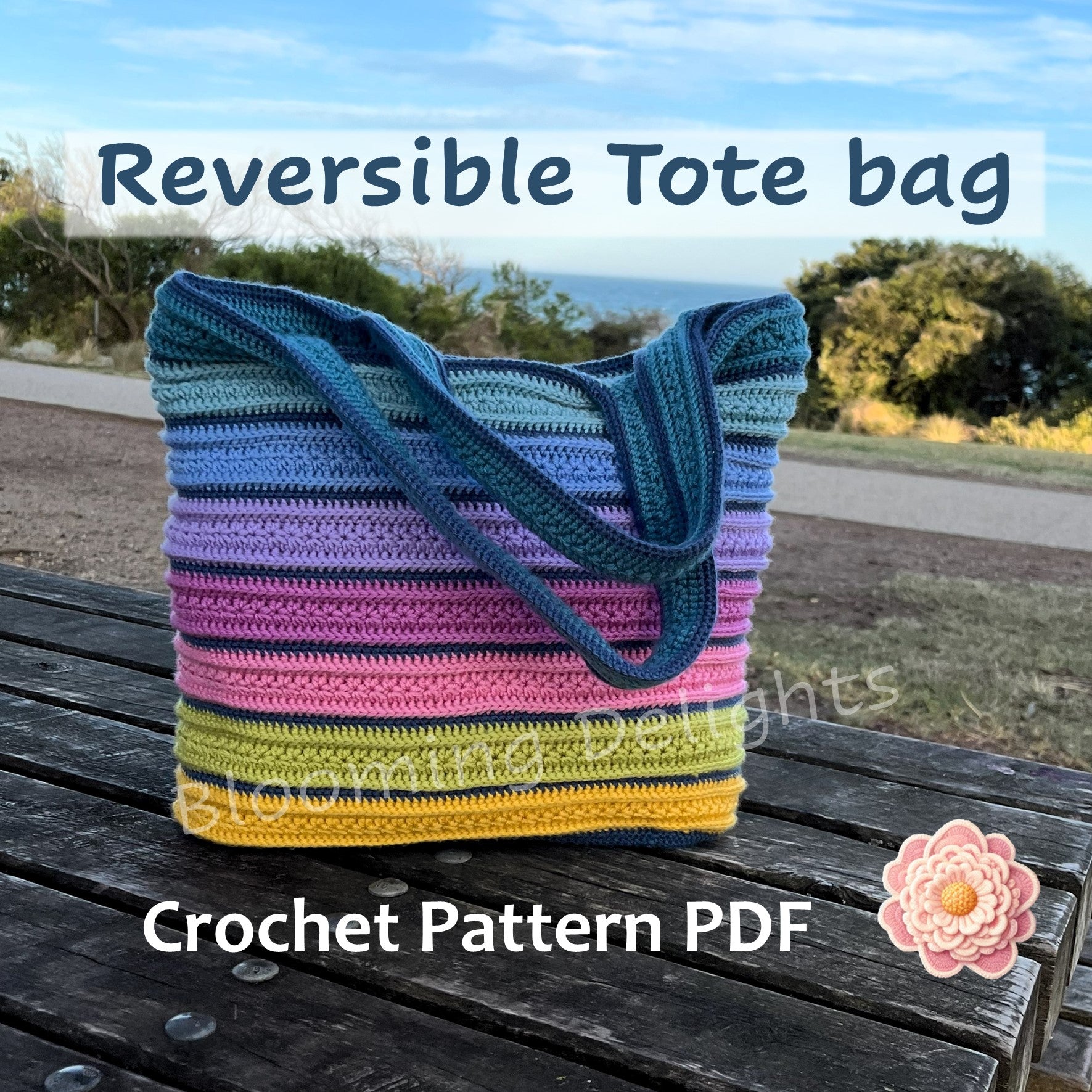 Reversible tote bag with colorful stripes on a wooden surface, outdoors.