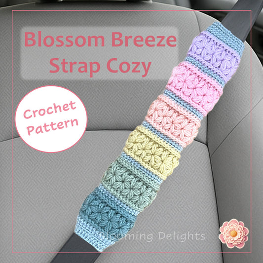 Colorful crochet strap cozy on a car seat with 'Blossom Breeze Strap Cozy' text.